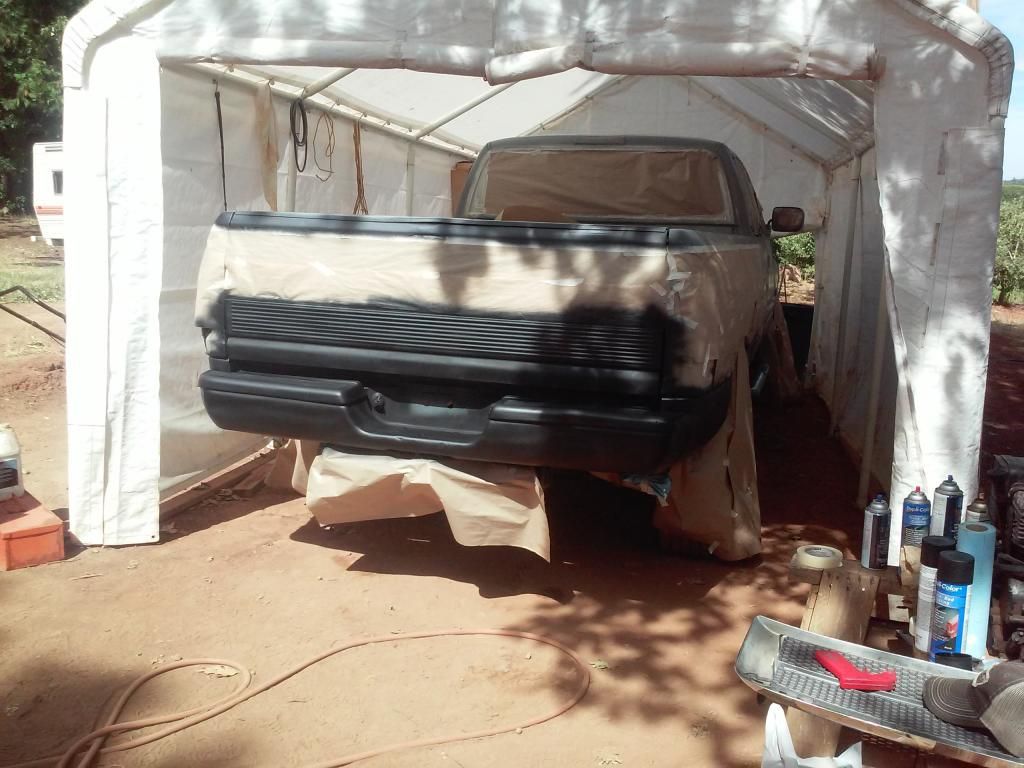 painting my 97 cummins red and black with plasti dip and bed liner