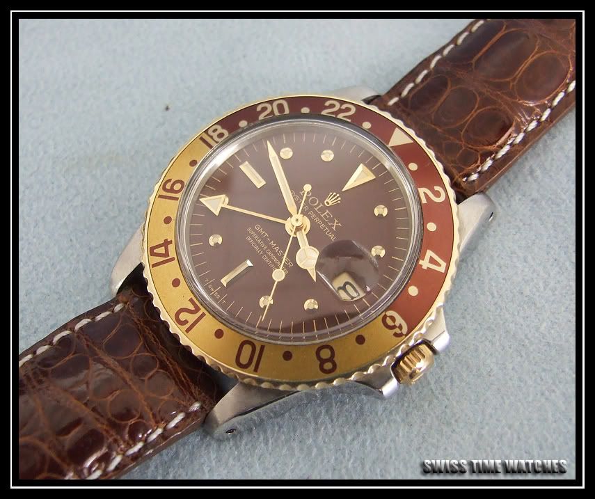 http://i28.photobucket.com/albums/c225/Swiss_Time_Watches/stw3/mrolgmtnes004.jpg
